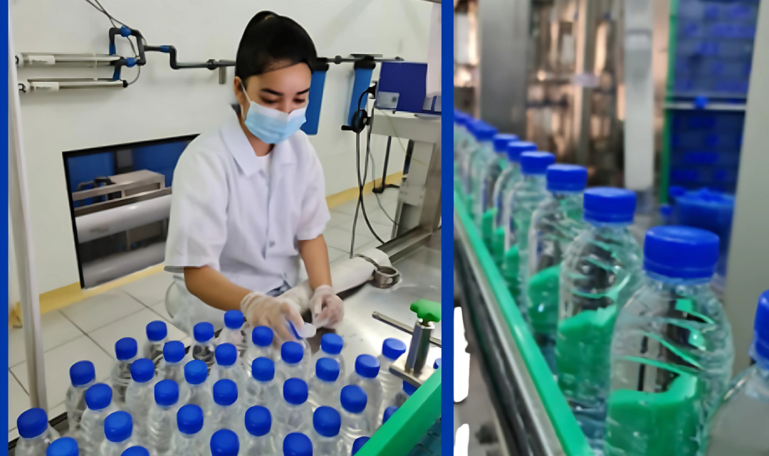 A factory worker wearing a mask and gloves inspecting bottled water on an assembly line; adjacent conveyor belt with rows of sealed water bottles.